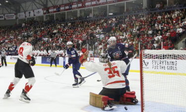 Hilary Knight celebrates her hat-trick goal during the gold medal game.