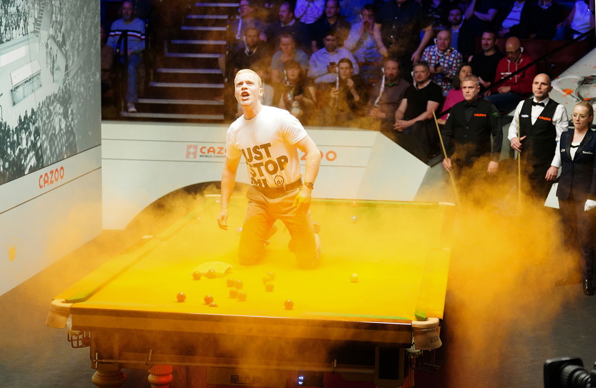 <i>Mike Egerton/PA Images/Getty Images</i><br/>A Just Stop Oil protester recently disrupted the World Snooker Championship on Monday.