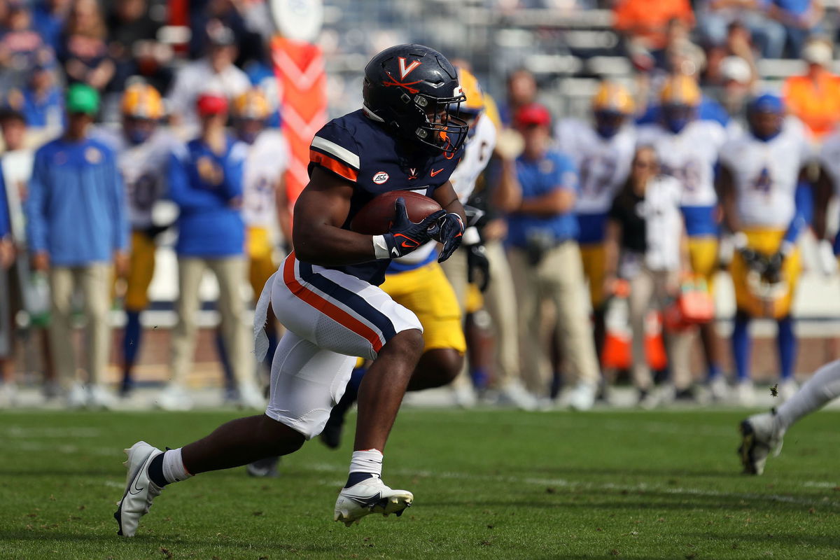 <i>Ryan M. Kelly/Getty Images/FILE</i><br/>Mike Hollins rushes in the first half during a game at Scott Stadium on November 12