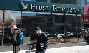 A person walks past a First Republic bank branch in Manhattan on April 24 in New York City.