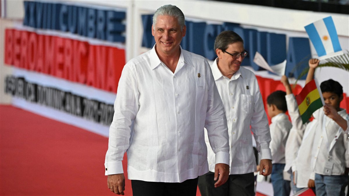 <i>Federico Parra/AFP/Getty Images</i><br/>Cuban President Miguel Diaz-Canel (L) term has been marked by a succession of calamities that pushed Cuba even nearer to the brink of economic collapse.