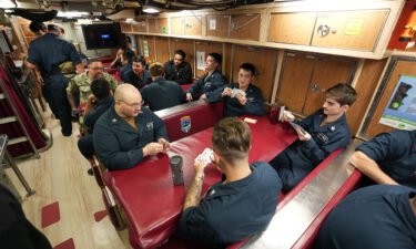 Sailors socialize on board the USS Mississippi on March 29.