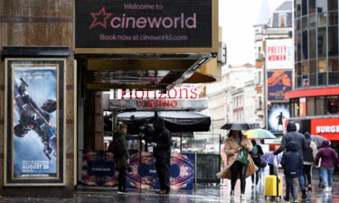 Cineworld shares tank Monday after Regal Cinemas owner ditches plans to sell US and UK businesses. Pictured is a Cineworld theater in London in 2020.