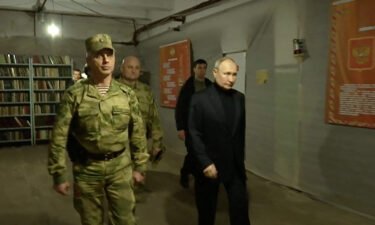 Putin visits the national guard headquarters in the occupied Luhansk region in eastern Ukraine.
