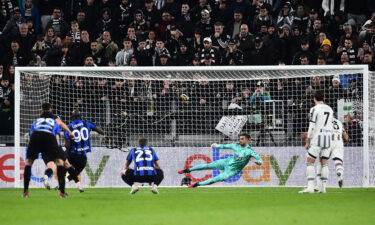 Lukaku scores his team's first goal from the penalty spot.