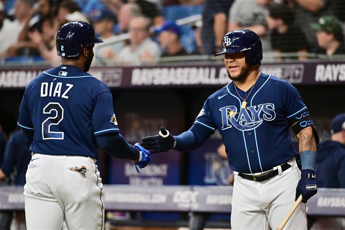<i>Julio Aguilar/Getty Images</i><br/>Yandy Diaz and Harold Ramírez celebrate in the third inning against the Houston Astros.