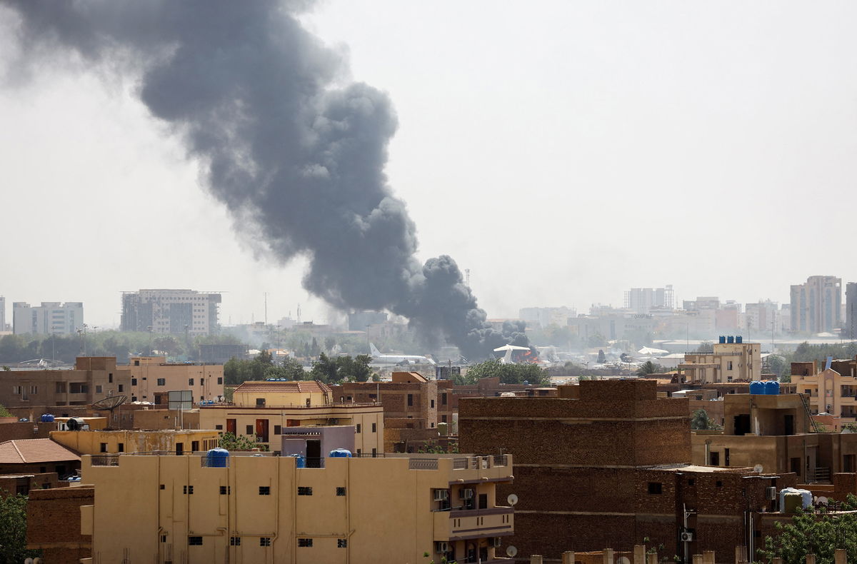 <i>Stringer/Reuters</i><br/>Smoke rises from burning aircraft inside Khartoum Airport during clashes between the paramilitary Rapid Support Forces and the army in Khartoum