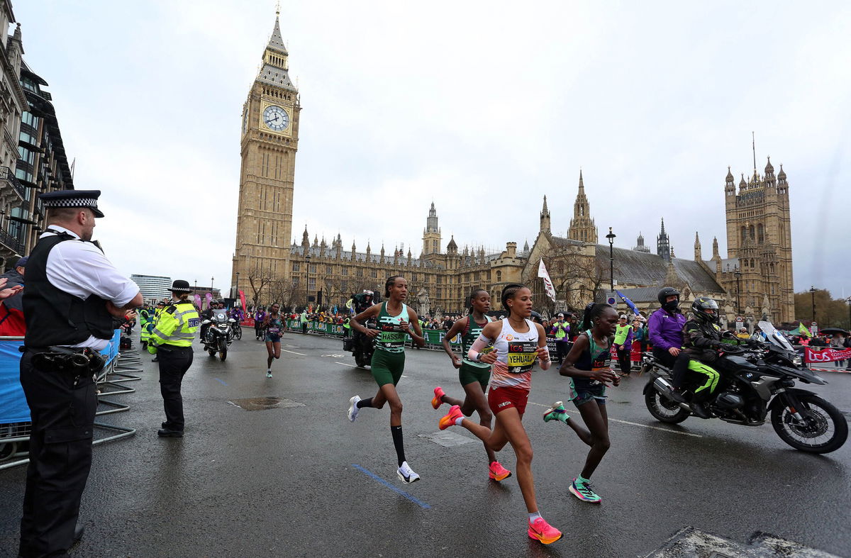 <i>Susannah Ireland/AFP/Getty Images</i><br/>Hassan (center left) passes Big Ben on her way to an unexpected victory in London.