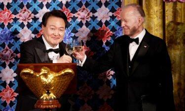 President Joe Biden and South Korea's President Yoon Suk Yeol exchange toasts during an official State Dinner in Washington