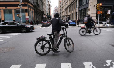 An electric bicycle moves through the streets of Manhattan in November 2022 in New York City.