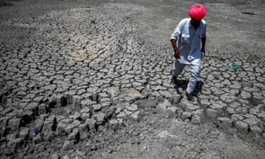 Deadly heat waves fueled by climate change are threatening India's development and risk reversing its progress on economic growth