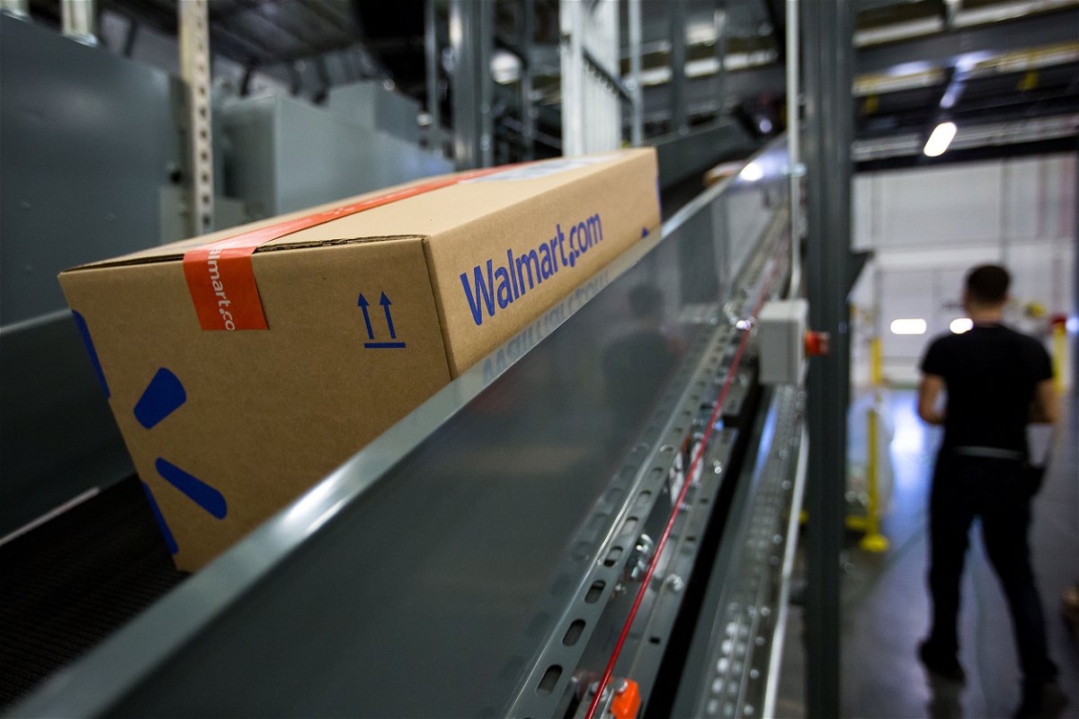<i>Michael Nagle/Bloomberg/Getty Images</i><br/>A package moves along a conveyor belt inside a Wal-Mart Stores Inc. fulfillment center in Bethlehem