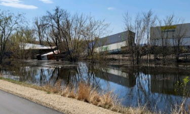 Train cars fell into the Mississippi River in Wisconsin after a train derailed on April 27.