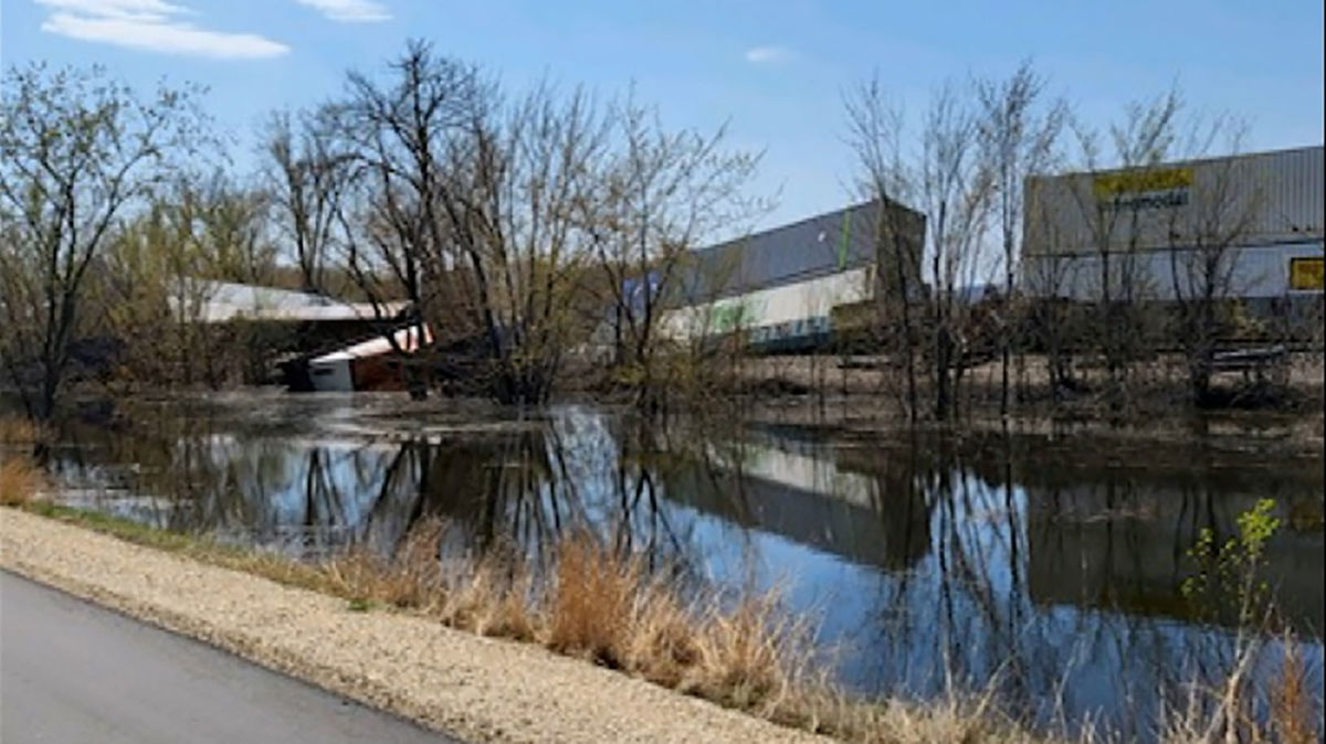 <i>Provided to CNN</i><br/>Train cars fell into the Mississippi River in Wisconsin after a train derailed on April 27.