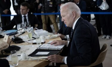 President Joe Biden on Friday sits at a working lunch roundtable with the other G7 world leaders.