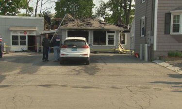 Damage was contained to the building and the fire didn't spread to two nearby homes.