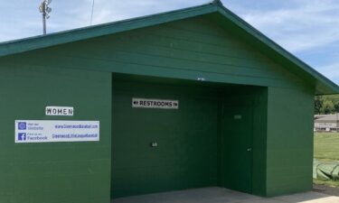 Police are investigating after a father claims he walked in on his son being fondled by a stranger in the Greenwood Little League bathroom over the weekend. According to a police report