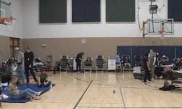 Dozens of students at Copper Hills High School took turns donating blood with a goal of donating more than 100 units of blood