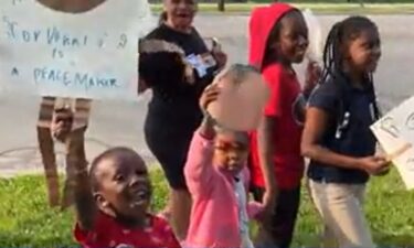 Milwaukee community partners and city leaders led a neighborhood walk near the Journey House to demonstrate the city's commitment to reducing violence this summer.