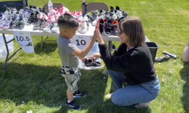Lincoln Center student receiving shoes