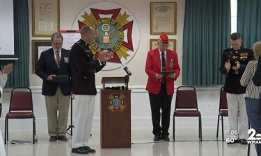 World War II veteran Colonel Louis J. Schott