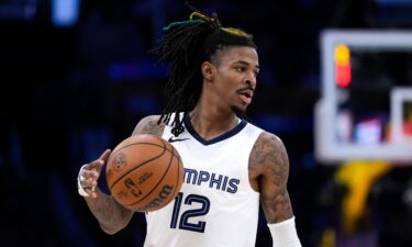 Memphis Grizzlies' Ja Morant dribbles during the second half in Game 4 of a first-round NBA basketball playoff series against the Los Angeles Lakers Monday