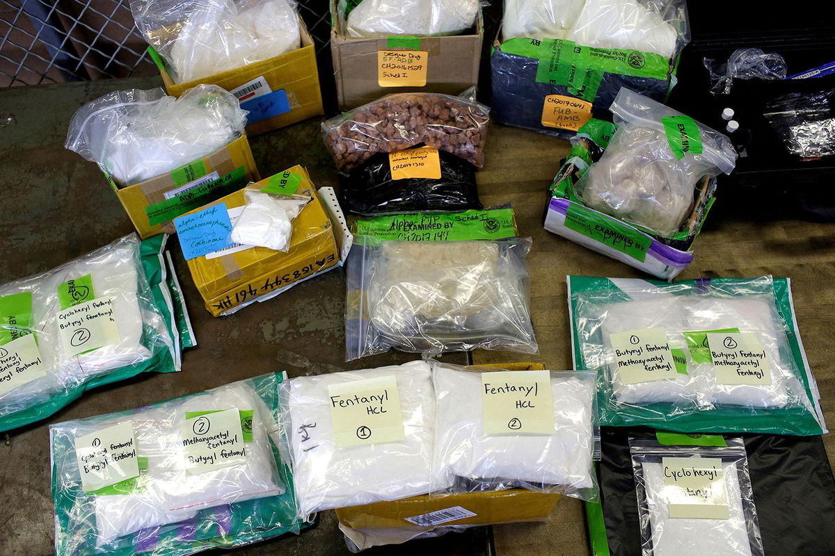 <i>Joshua Lott/Reuters</i><br/>Plastic bags of Fentanyl are displayed on a table at the U.S. Customs and Border Protection area at the International Mail Facility at O'Hare International Airport in Chicago in November of 2017.