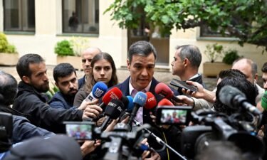 Spain's Prime minister Pedro Sanchez of Socialist Party (PSOE) talks to media after voting in Madrid on May 28
