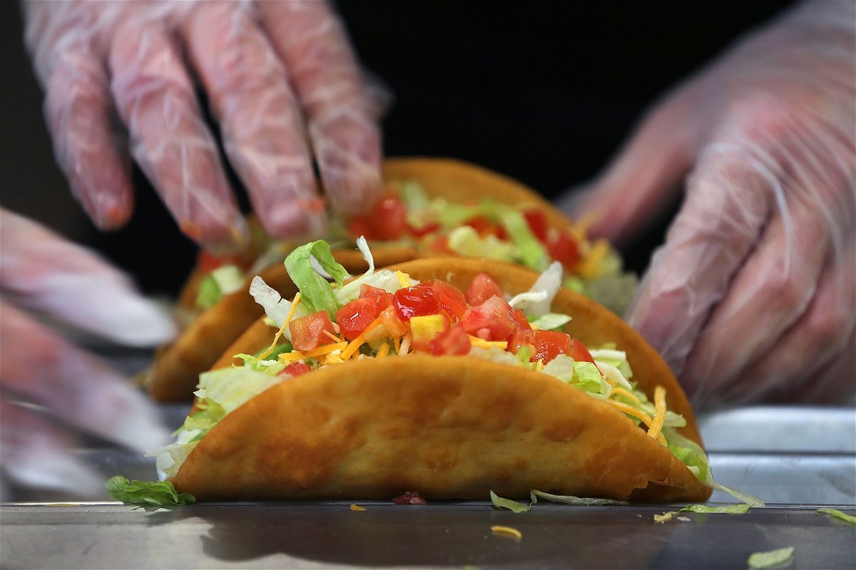 <i>John Tlumacki/The Boston Globe/Getty Images</i><br/>Tacos are made to order at the Taco Bell Cantina in Brookline