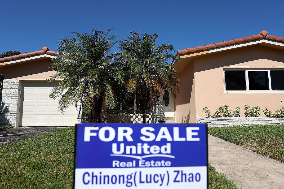 <i>Joe Raedle/Getty Images</i><br/>A 'For Sale' sign is posted in front of a single family home on October 27