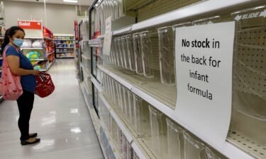 A sign on an empty shelf informs customers that there is no stock in the back for infant formula at a supermarket in 2022 in New York City.