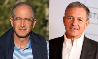 Comcast is inching closer to selling its stake of Hulu to Disney. Pictured are Comcast and Disney CEOs Brian Roberts and Bob Iger