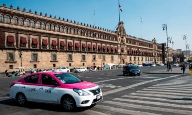 A taxi is seen at the National Palace in Mexico City