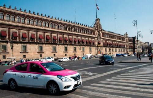 A taxi is seen at the National Palace in Mexico City