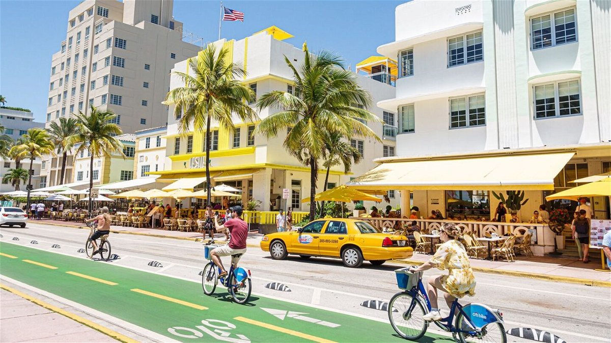 <i>Jeffrey Greenberg/Universal Images Group/Getty Images</i><br/>Miami Beach's Ocean Drive is a magnet for tourists.