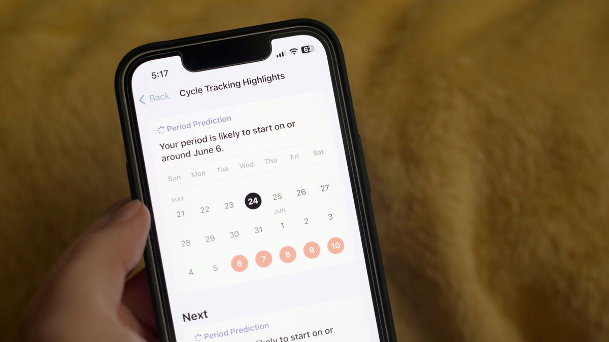 <i>Rebecca Wright/CNN</i><br/>A person tracks their menstrual cycle using the Apple Health application on their phone. Women with irregular menstrual cycles or cycle lengths may face a higher risk of cardiovascular disease.