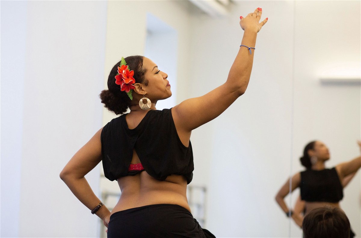 <i>Erica Lee/CNN</i><br/>Linda Peralte practices her hand movement and dance in New York. 