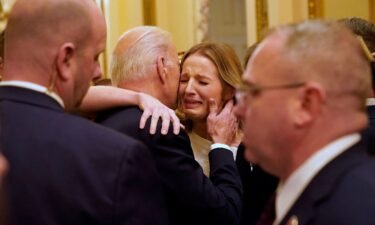 President Joe Biden hugs Brittany Alkonis