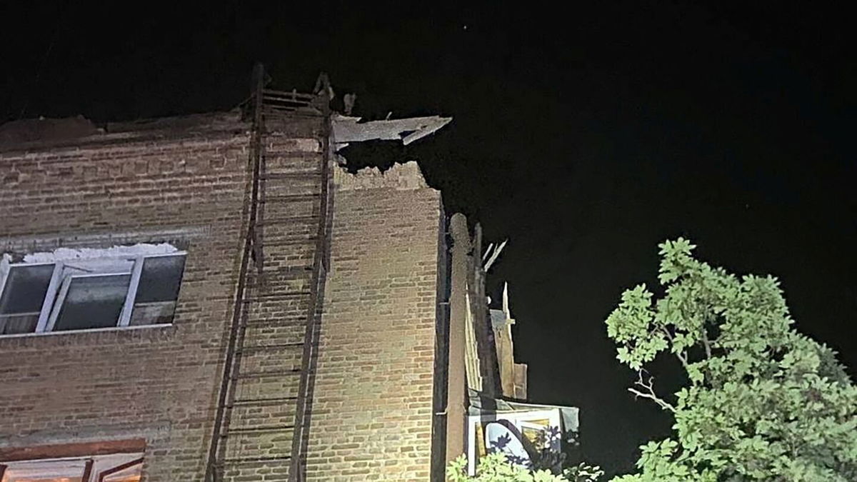 <i>Kyiv City Military Administration/Handout via Reuters</i><br/>A handout image shows the aftermath of falling debris at a building in Kyiv