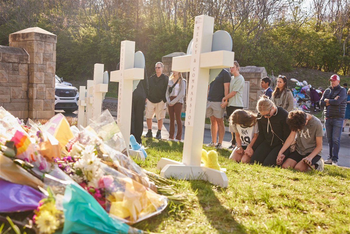 <i>Johnnie Izquierdo/The Washington Post/Getty Images</i><br/>People gather at a makeshift memorial at The Covenant School a day after the mass shooting.
