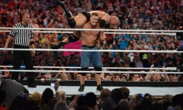 Dwayne ''The Rock'' Johnson and John Cena are seen here in action during WrestleMania XXVIII at Sun Life Stadium on April 1