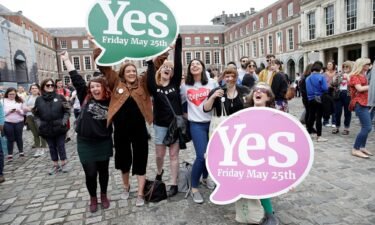 Women celebrate the result of the referendum on liberalizing abortion law