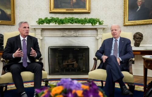 House Speaker Kevin McCarthy (left) of California speaks as he meets with President Joe Biden to discuss the debt limit in the Oval Office of the White House on May 22 in Washington.
