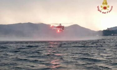A helicopter searched for missing passengers after the boat capsized.
