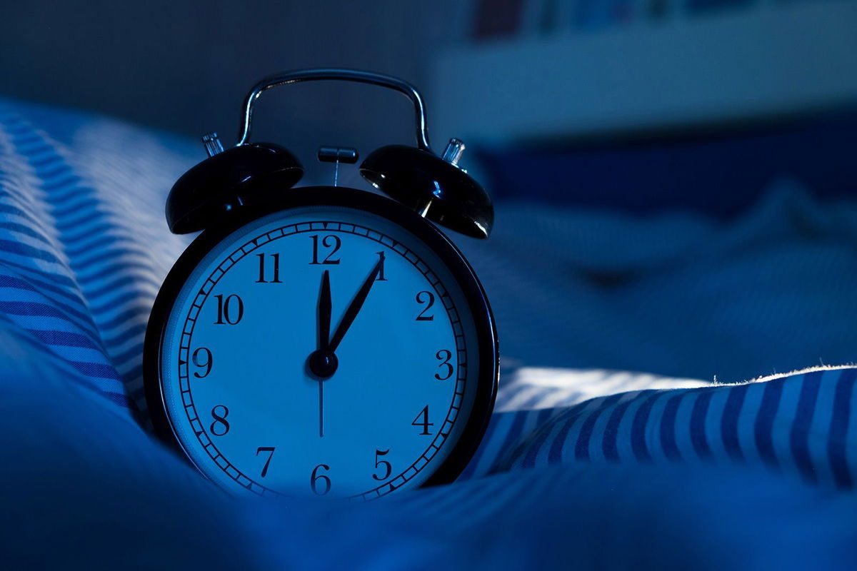 <i>Surapong Thammabuht/EyeEm/Getty Images</i><br/>Checking your clock when you wake up early can trigger stress and make it hard to go back to sleep