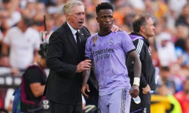 Madrid manager Carlo Ancelotti interacts with Vinícius Jr. during the La Liga match against Valencia.