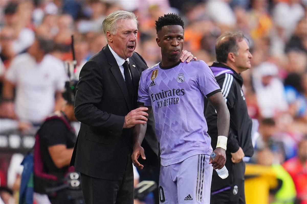 <i>Aitor Alcalde/Getty Images</i><br/>Madrid manager Carlo Ancelotti interacts with Vinícius Jr. during the La Liga match against Valencia.