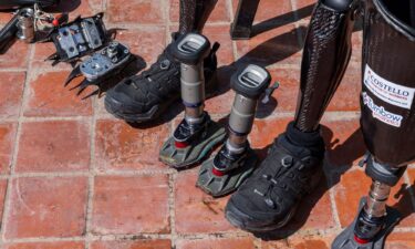 Hari Budha Magar displays his mountaineering gear ahead of his Everest attempt.