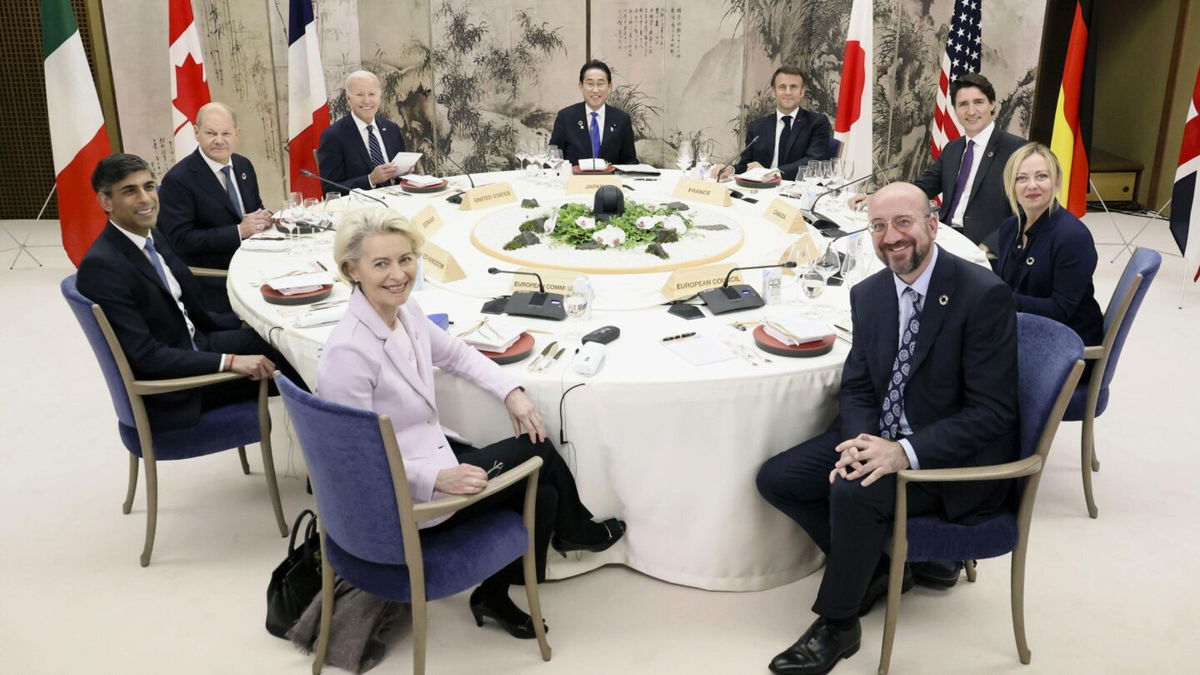 <i>Kyodo News/Getty Images</i><br/>Japanese Prime Minister Fumio Kishida (Center) hosts dinner for world leaders attending the G7 summit at a traditional Japanese inn in Hiroshima prefecture on Friday.