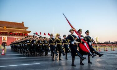 A Chinese stand-up comedian is forced to apologize after a military joke angers officials. Pictured is the Guard of Honor of the Chinese People's Liberation Army (PLA) at Tiananmen Square on January 1.
